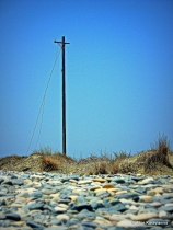Isolated electricity post at Lady's Mile beach